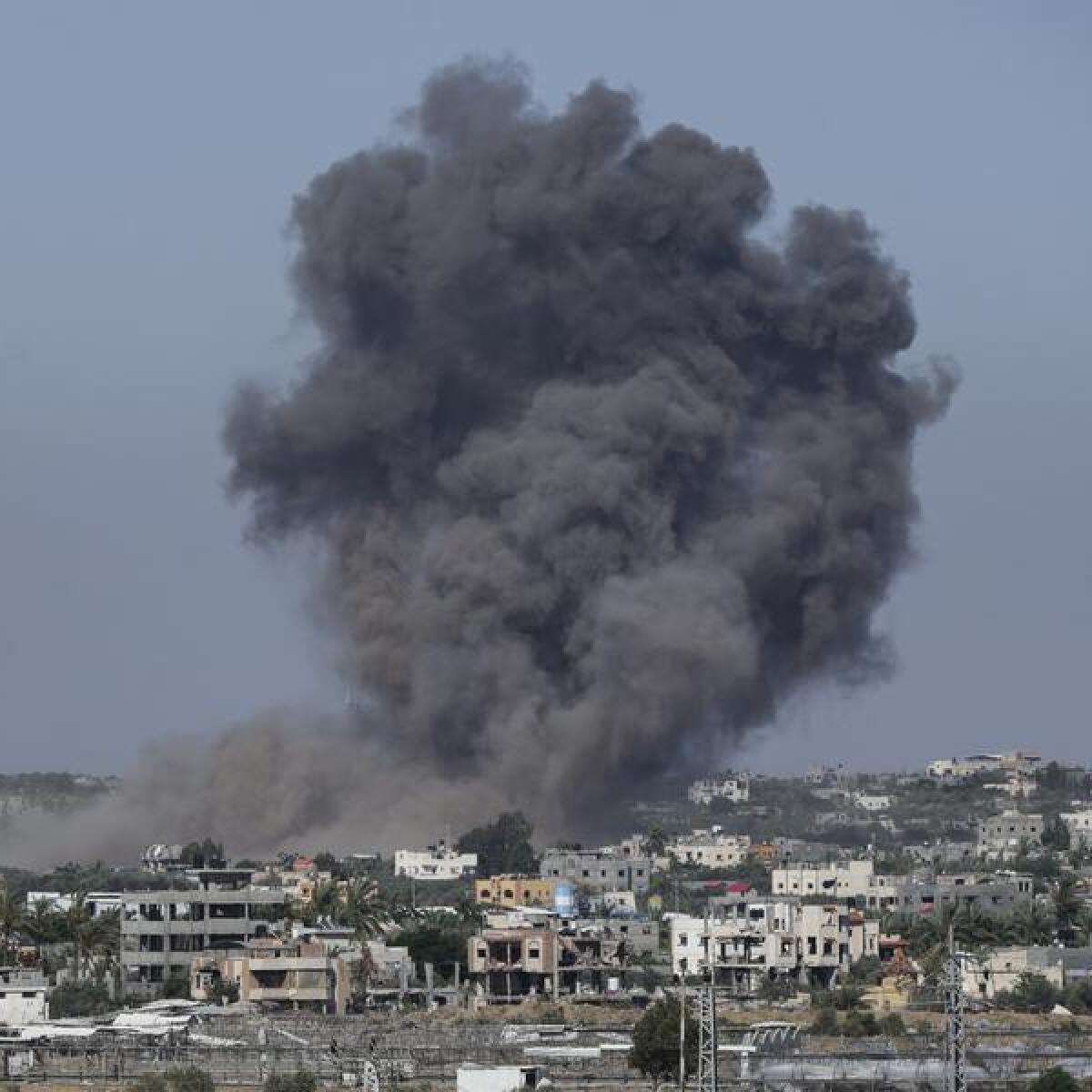 Smoke rises following an Israeli air strike in Rafah, Gaza Strip
