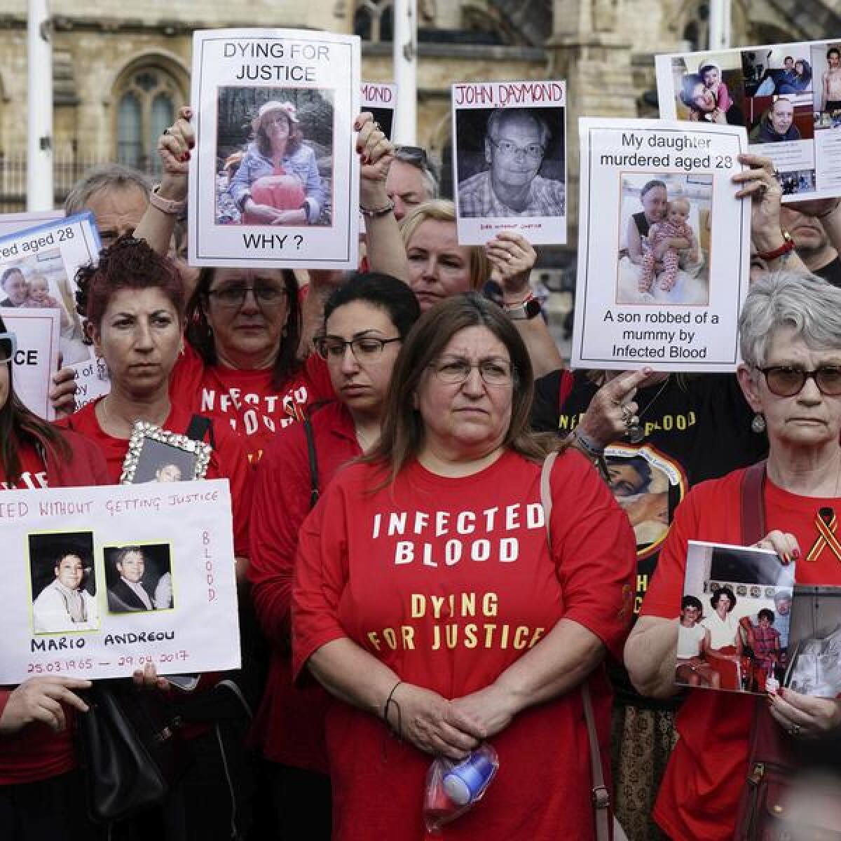 Infected blood campaigners gather in Parliament Square in London