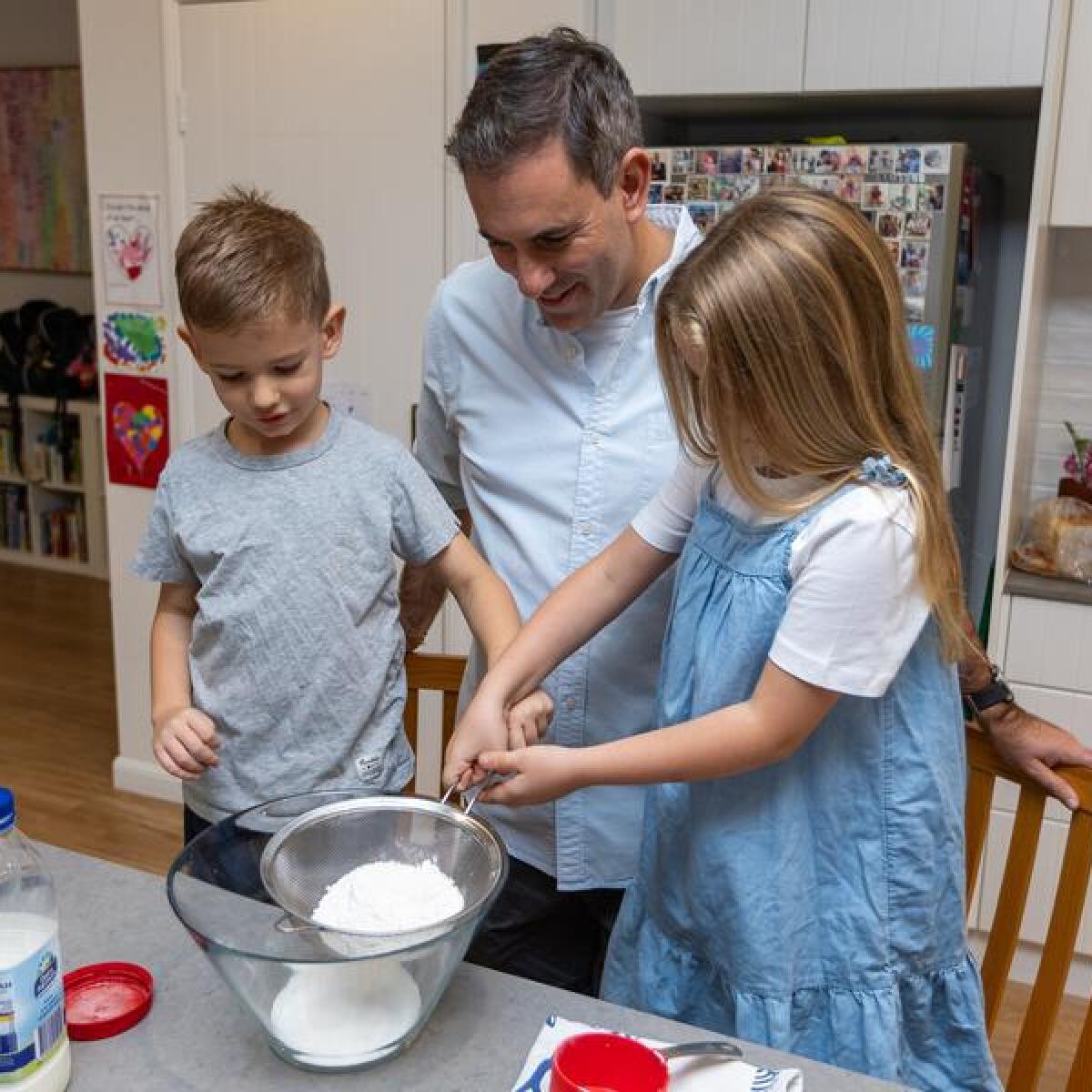 Jim Chalmers and his children making pancakes for Motherâ€™s Day