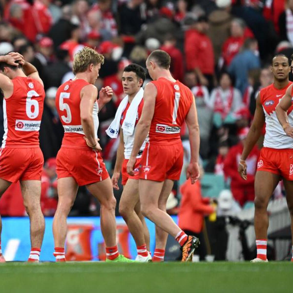 Disappointed Sydney Swans players.