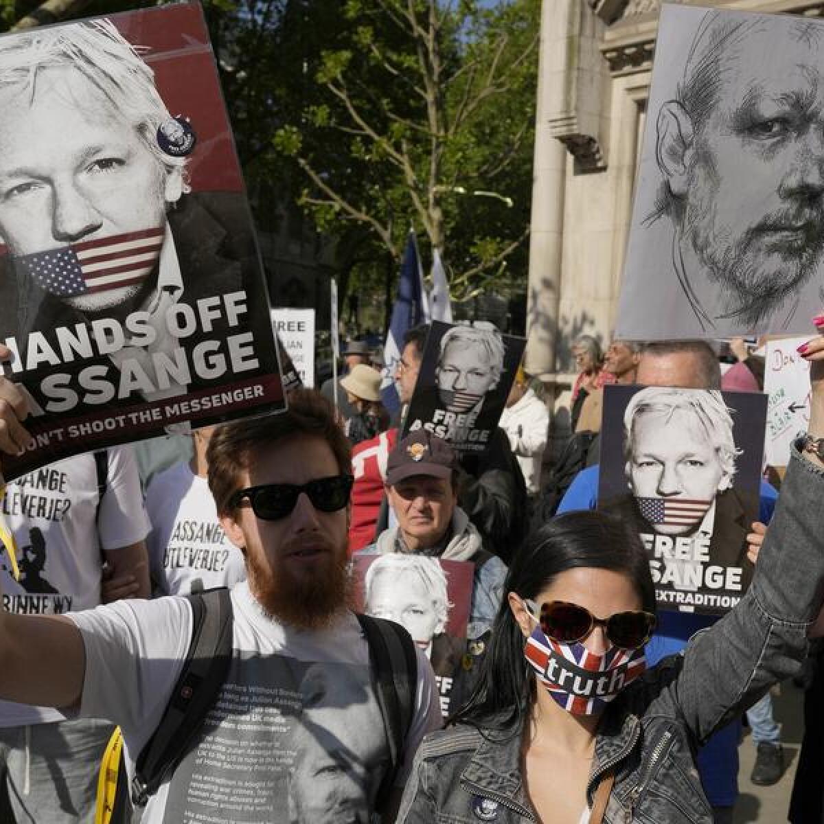Supporters of Julian Assange outside London's High Court