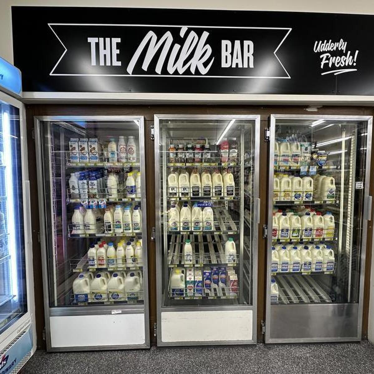 Milk in a refrigerator at a supermarket
