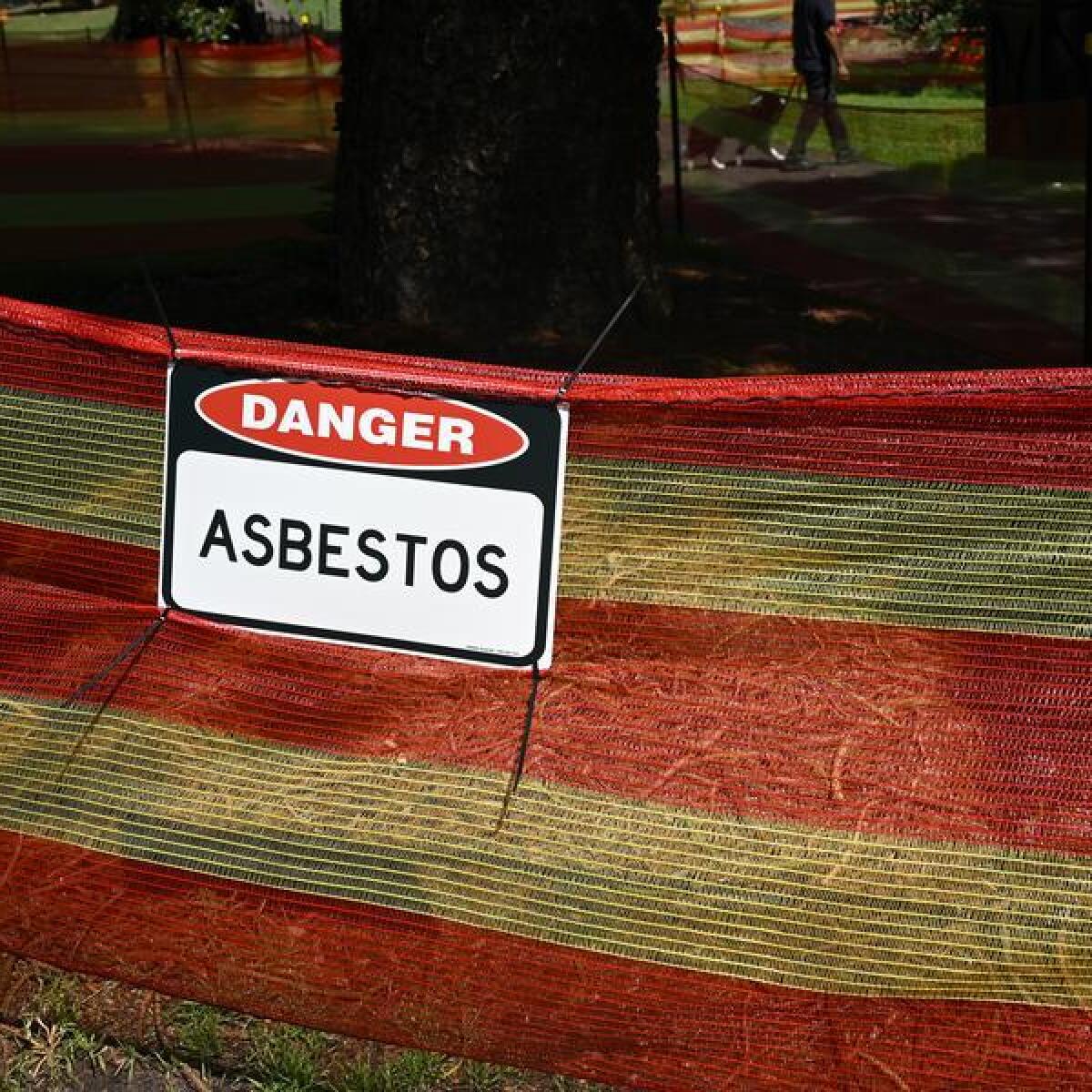 File pic of asbestos sign in a Sydney park