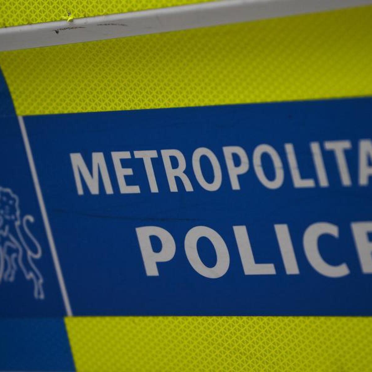 A metropolitan police logo on a vehicle in London, Britain