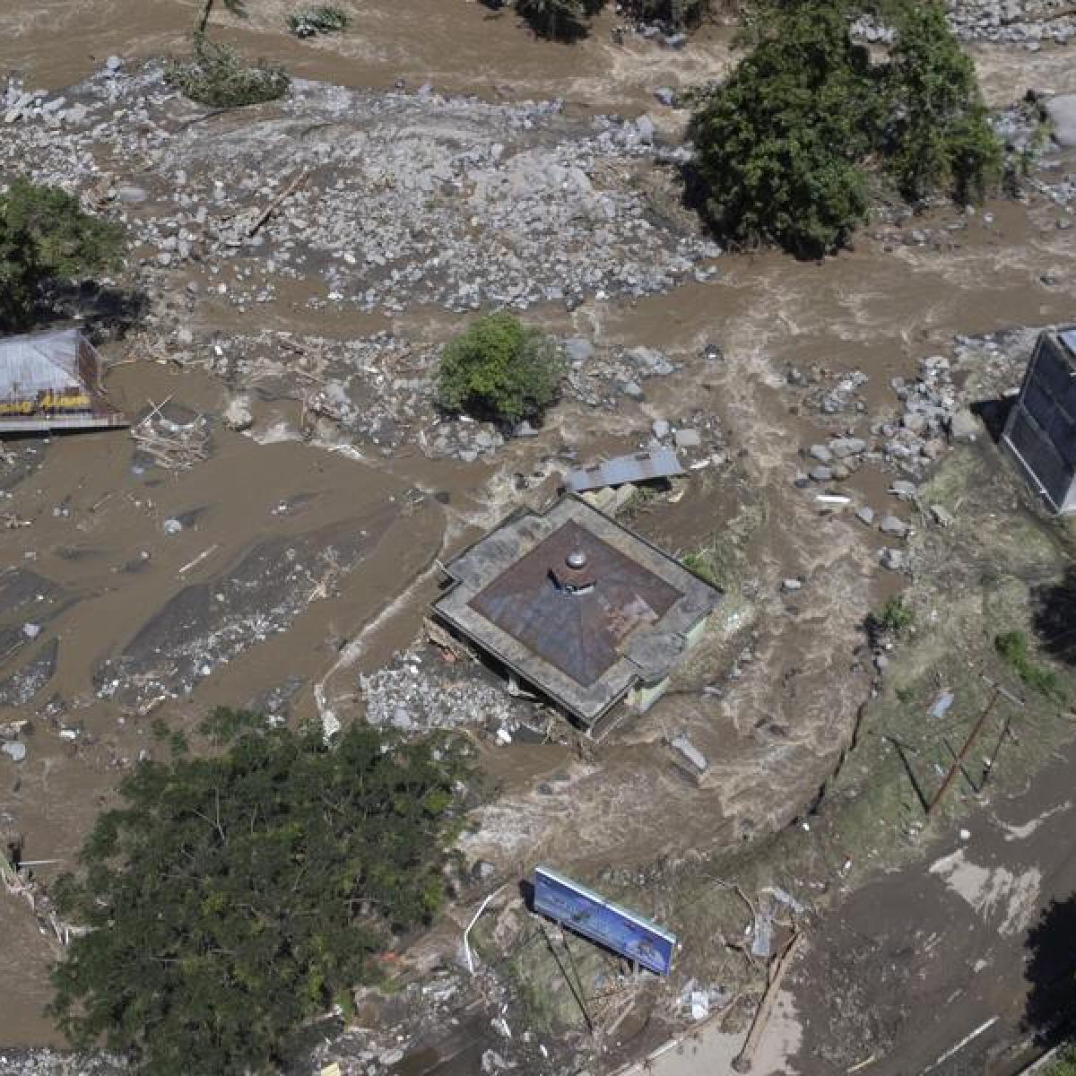Deadly flash floods, cold lava flow hit Indonâ€™s Sumatra