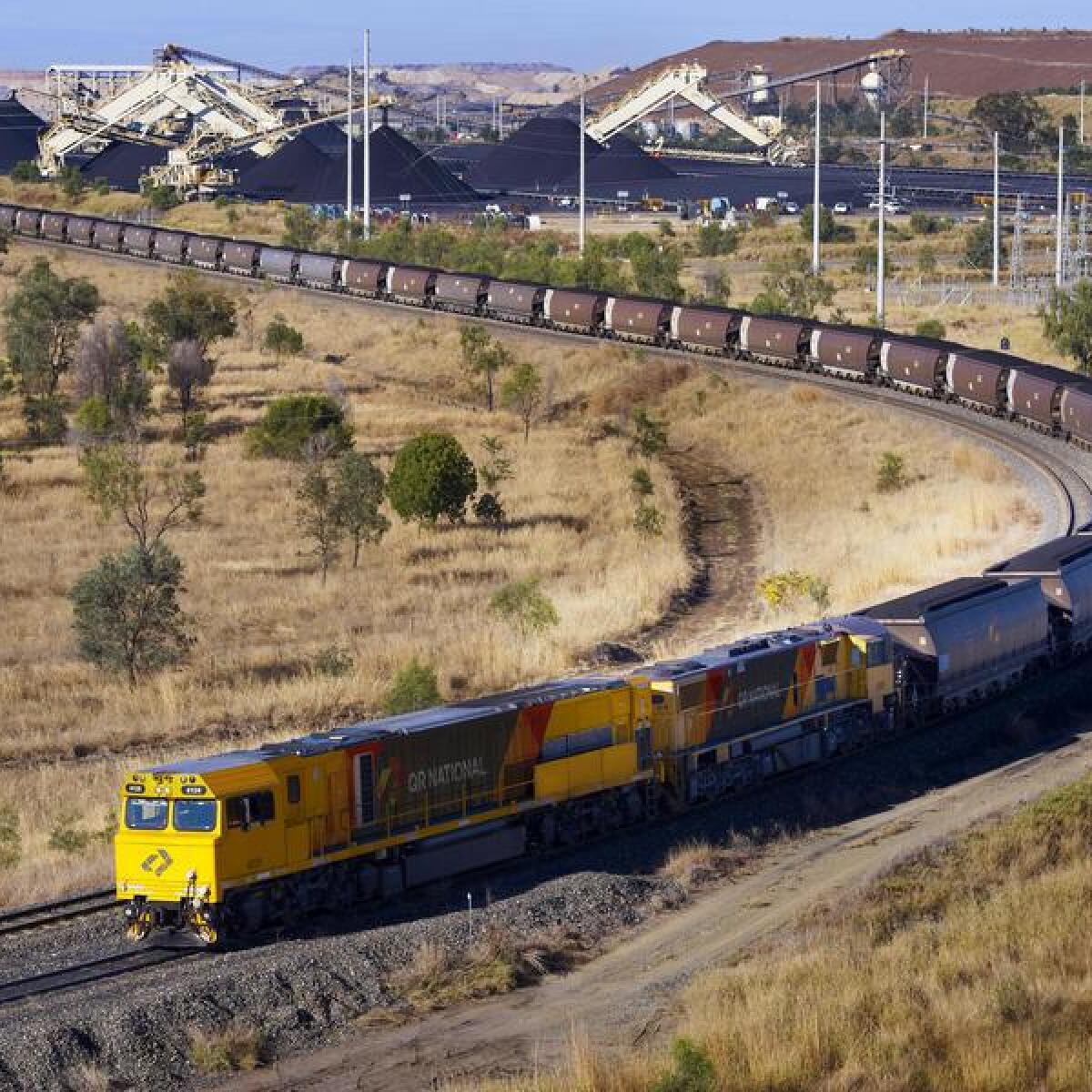 A freight train hauling coal in Moura