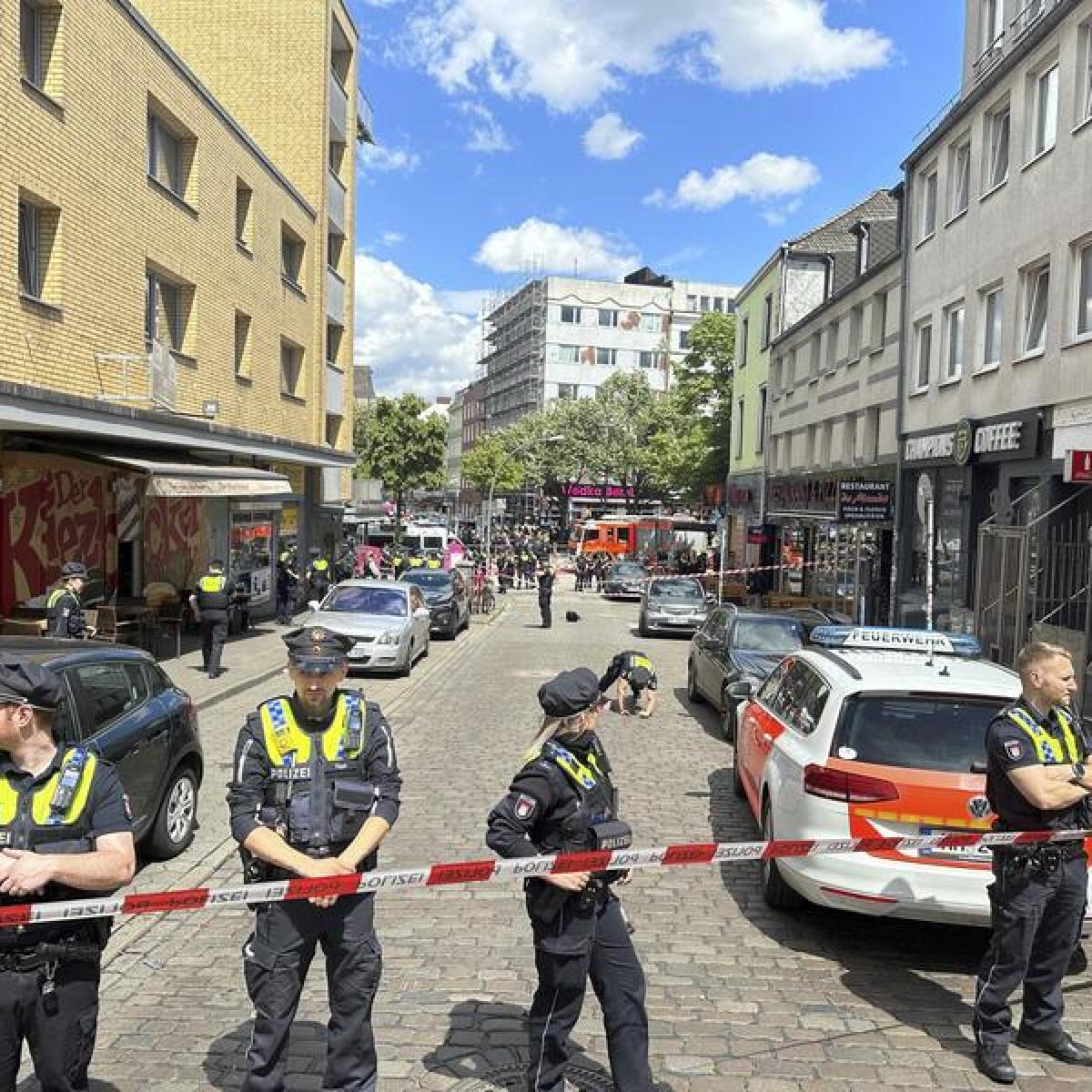 Police standing at the cordoned off area in Hamburg.