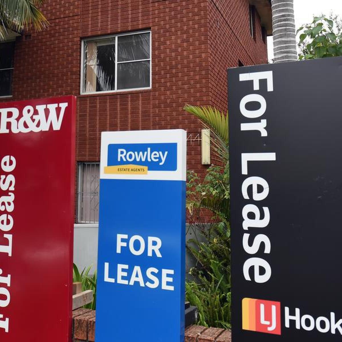 Lease signs outside a block of units in inner Sydney