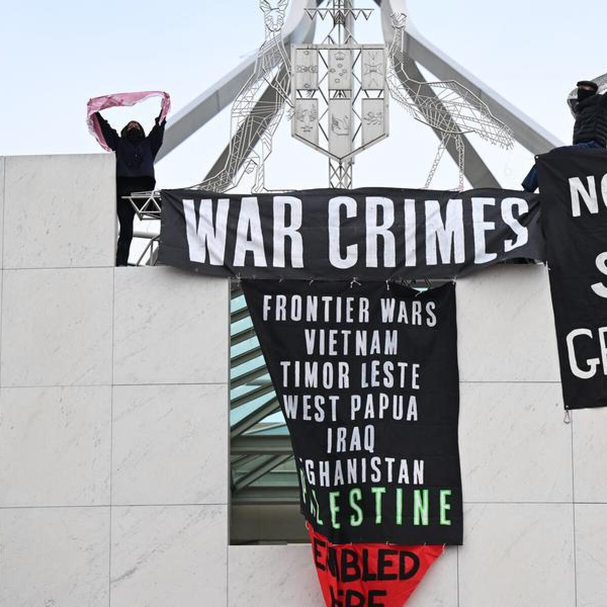 Pro-Palestine banners hanging from Parliament House