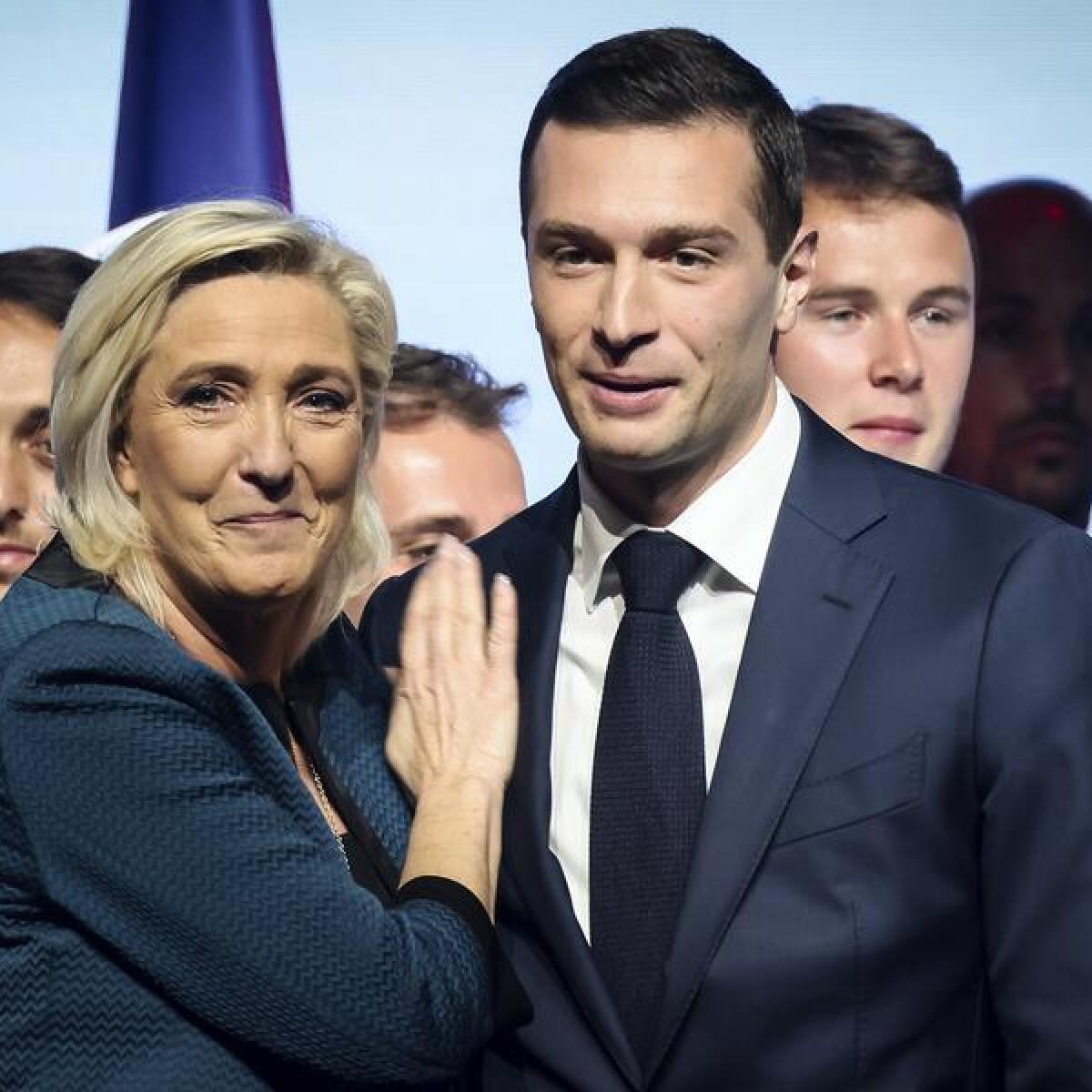 French far-right National Rally's Marine Le Pen and Jordan Bardella