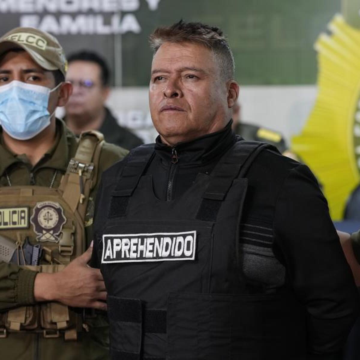 Bolivian police hold former Bolivian commander Juan Jose Zuniga