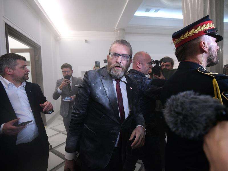 Polish ultranationalist MP extinguishes Hanukkah candle