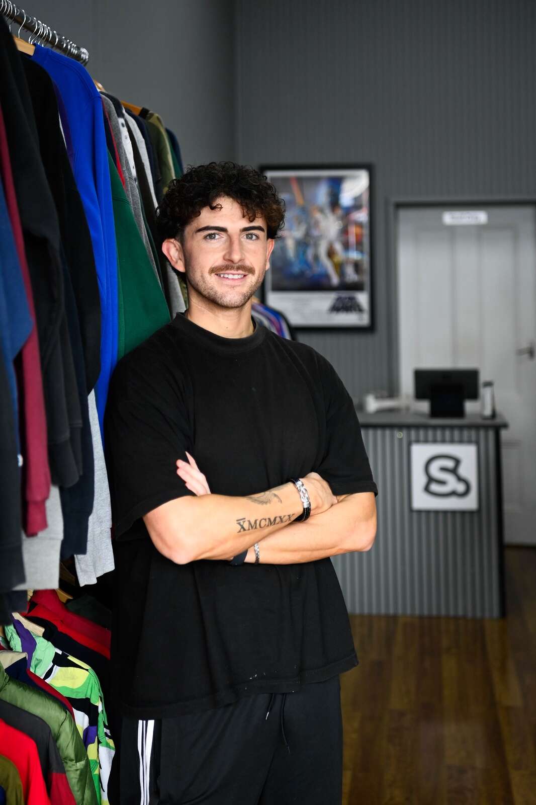 Local barber’s side project grows into vintage clothing business