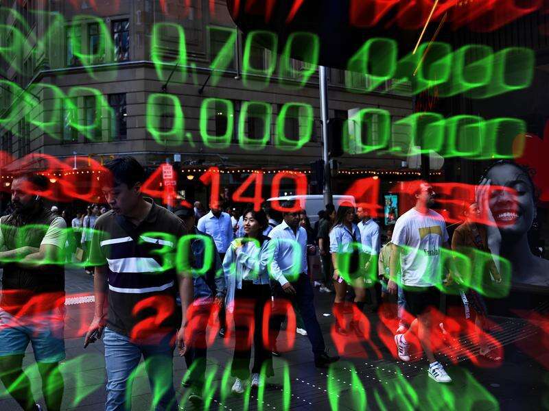 Shares dip, Aussie surges on rate hike expectations