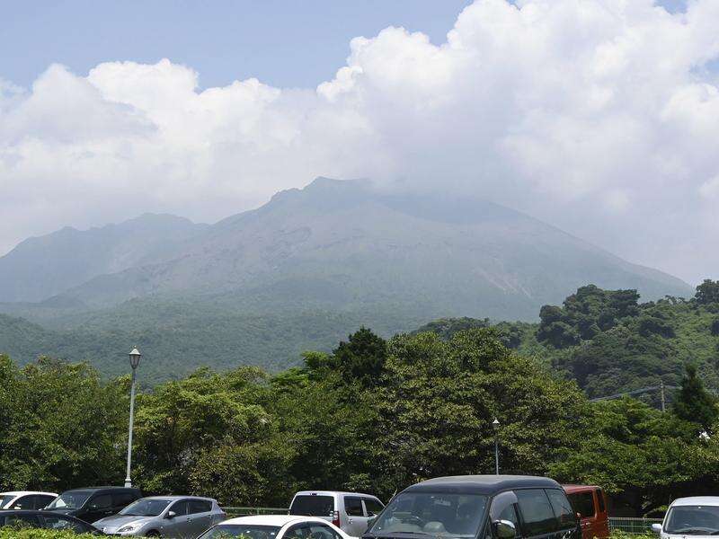 Ash plumes cancel flights as Japanese volcano erupts