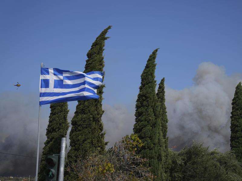 Greece wildfire contained as winds prompt evacuations