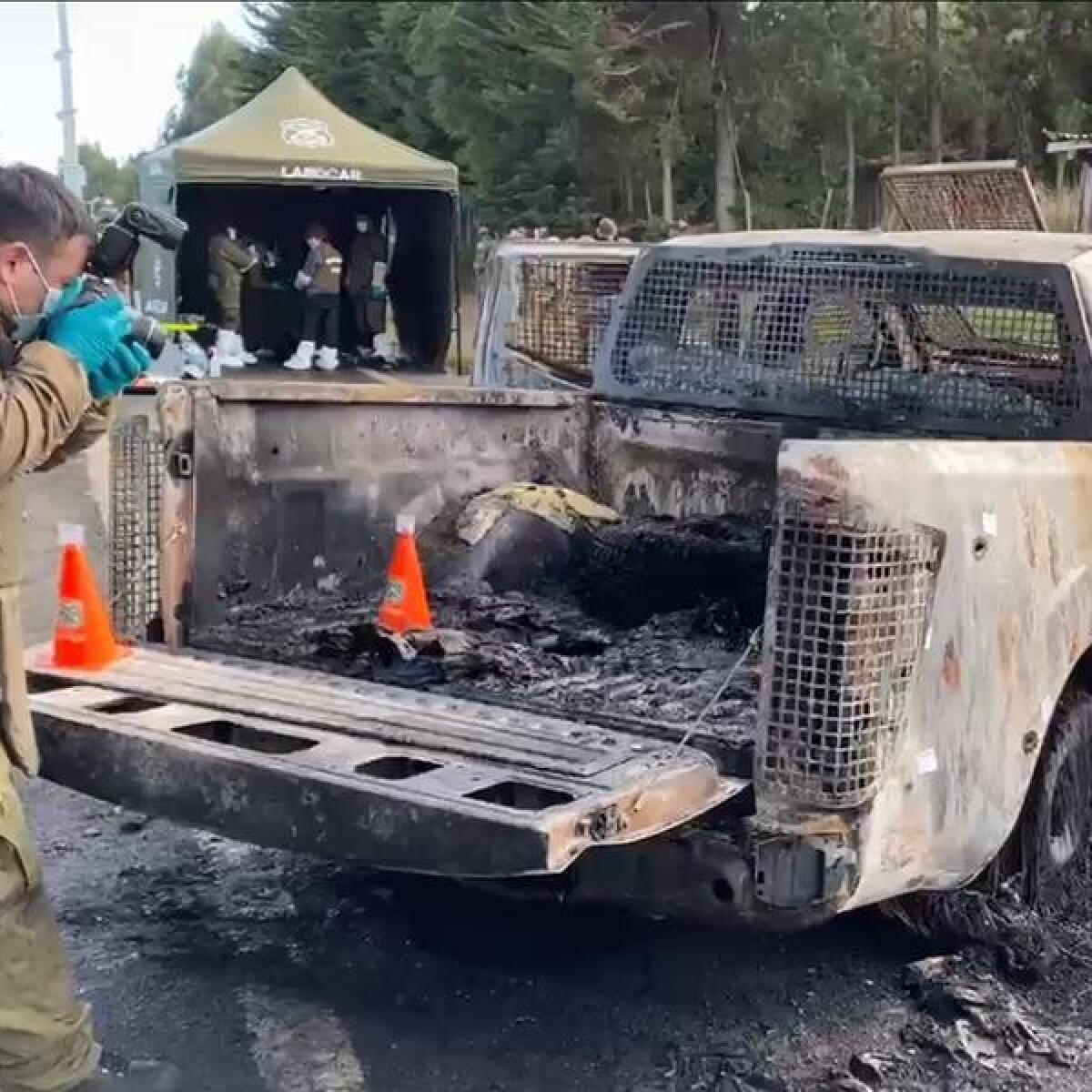 The burnt out police vehicle