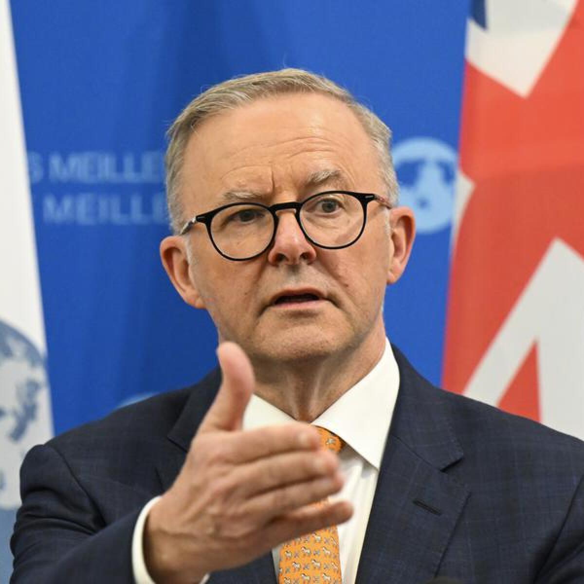 Anthony Albanese at a press conference at OECD headquarters.