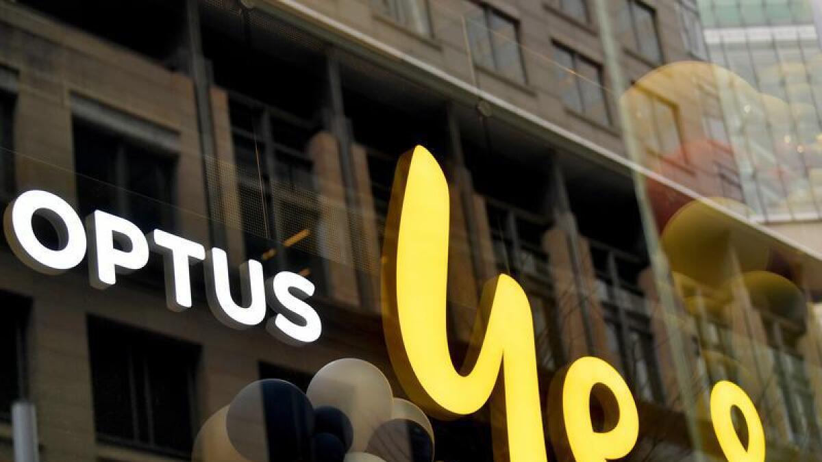 Signage is seen at an Optus store in Sydney