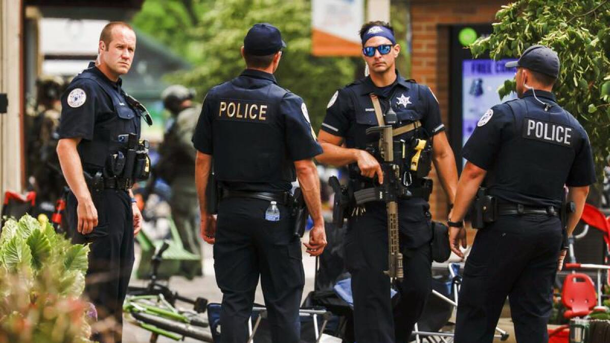 Officers investigate the scene of a mass shooting in Chicago