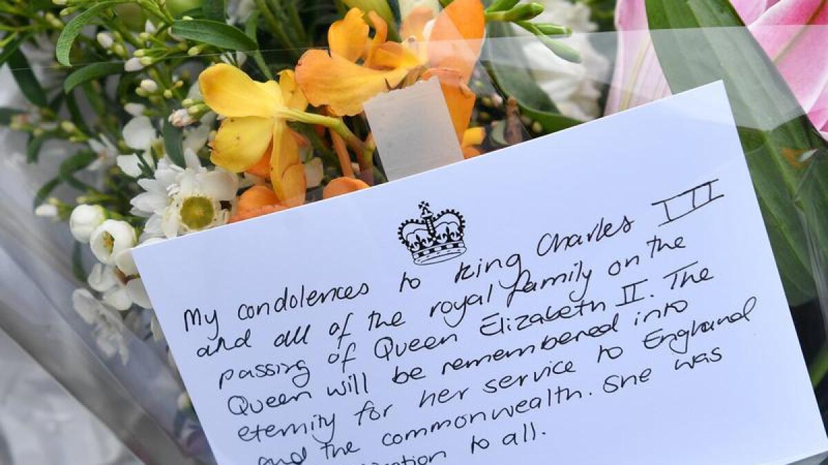Messages and flowers at Government House in Sydney.