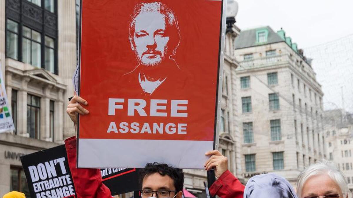 Protesters call for the release of Wikileaks founder Julian Assange.