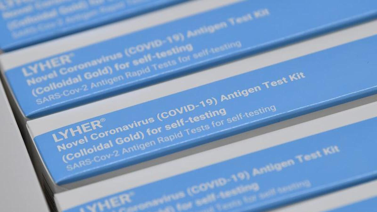 A box of Rapid Antigen Tests.