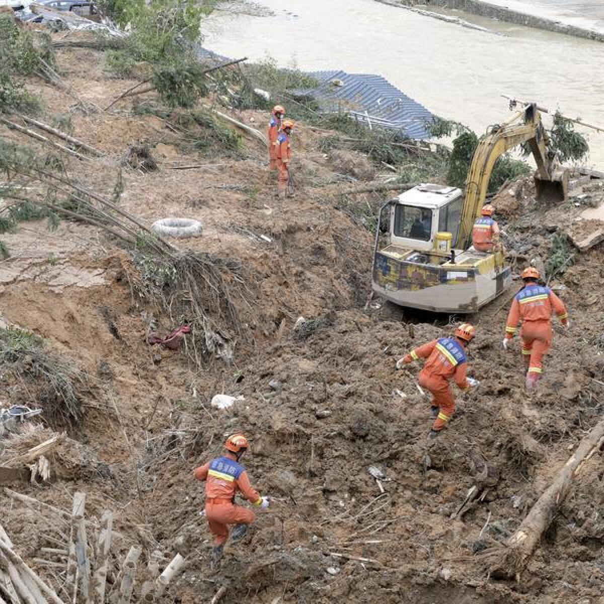 A file photo of recovery workers in Guangdong Province