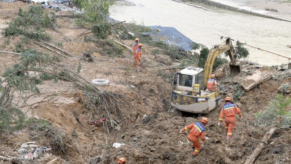 A file photo of recovery workers in Guangdong Province
