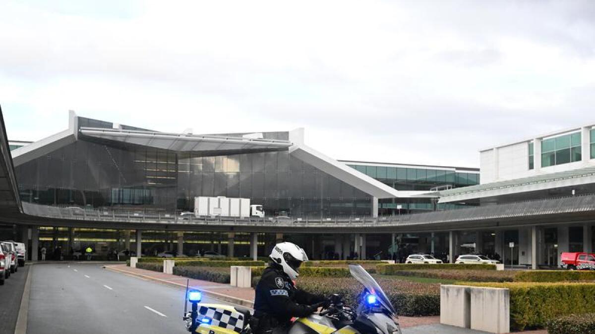Police at Canberra Airport on August 14