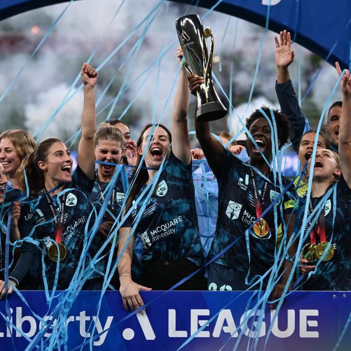 Sydney FC players celebrate ALW grand final success.