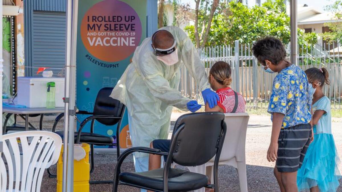 A file image of people being vaccinated in Katherine