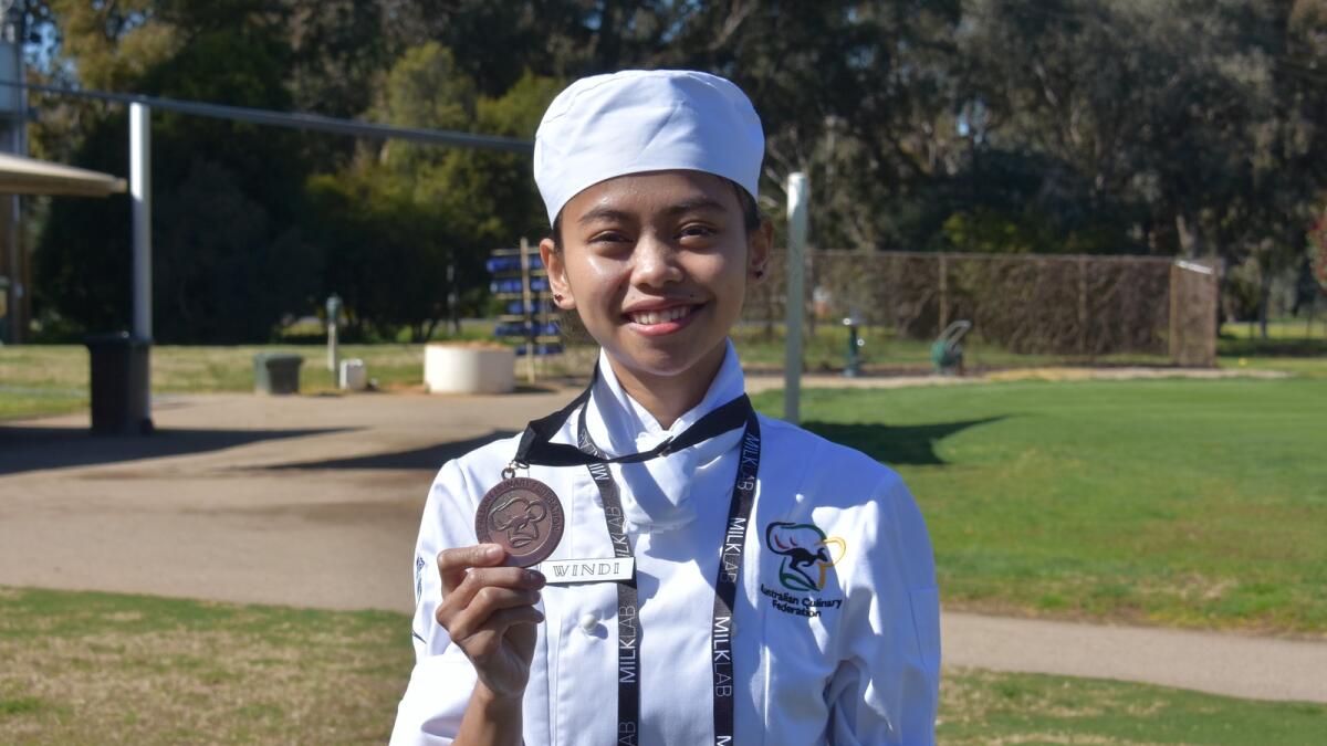 Benalla Golf Club first year apprentice chef Windi Juli Safitri with the bronze medal she recently won at the Australian Fine Food awards 2022.