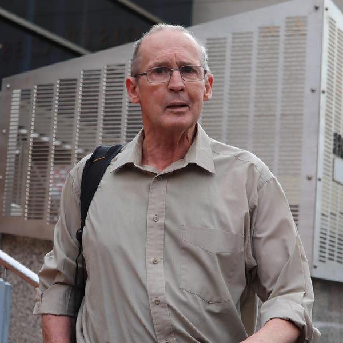 Nicolaas Ockert Bester leaves the Hobart Magistrates Court