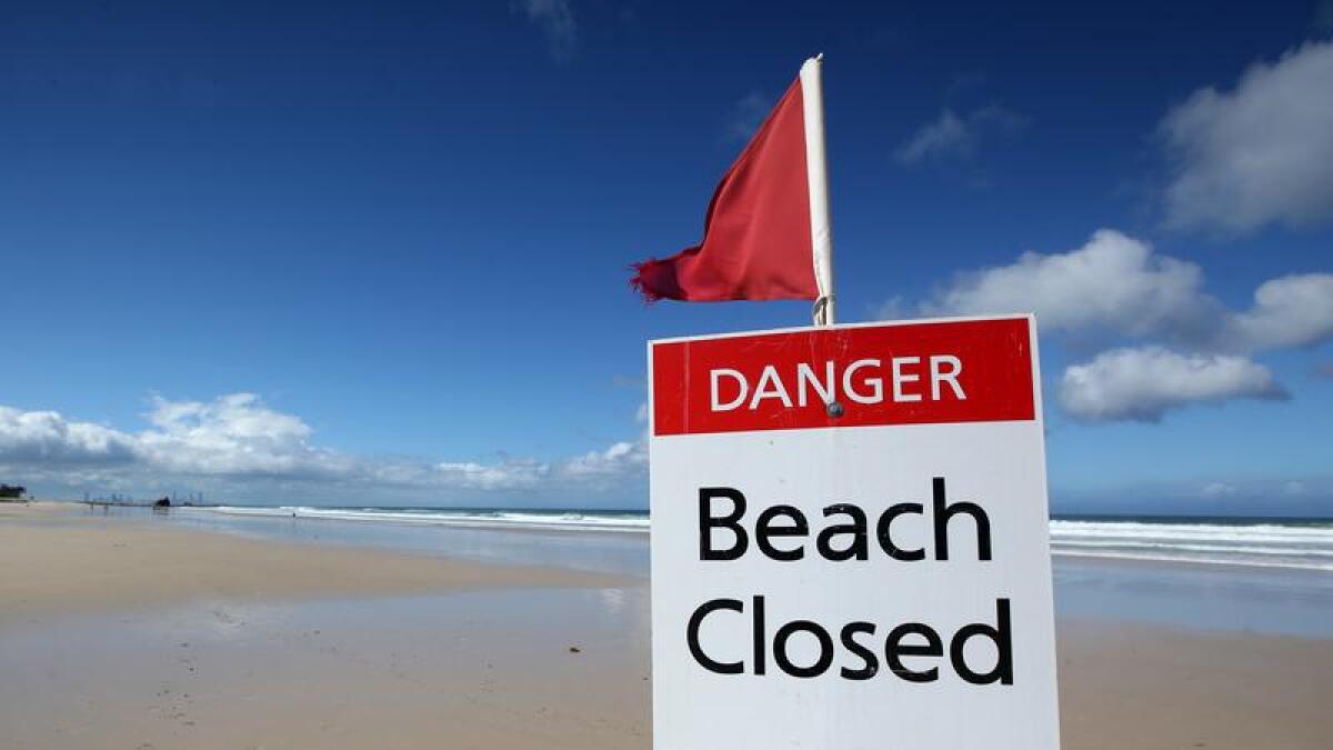 Closed beach sign