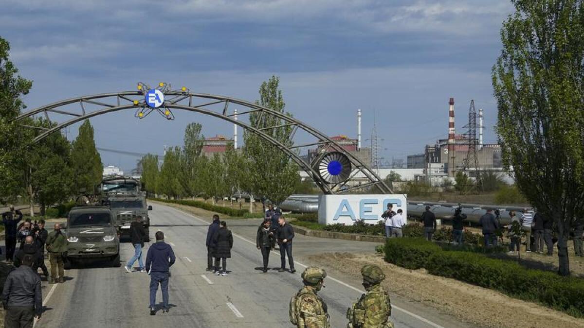 Russian servicemen at the entry to Zaporizhzhia Nuclear Power Station.