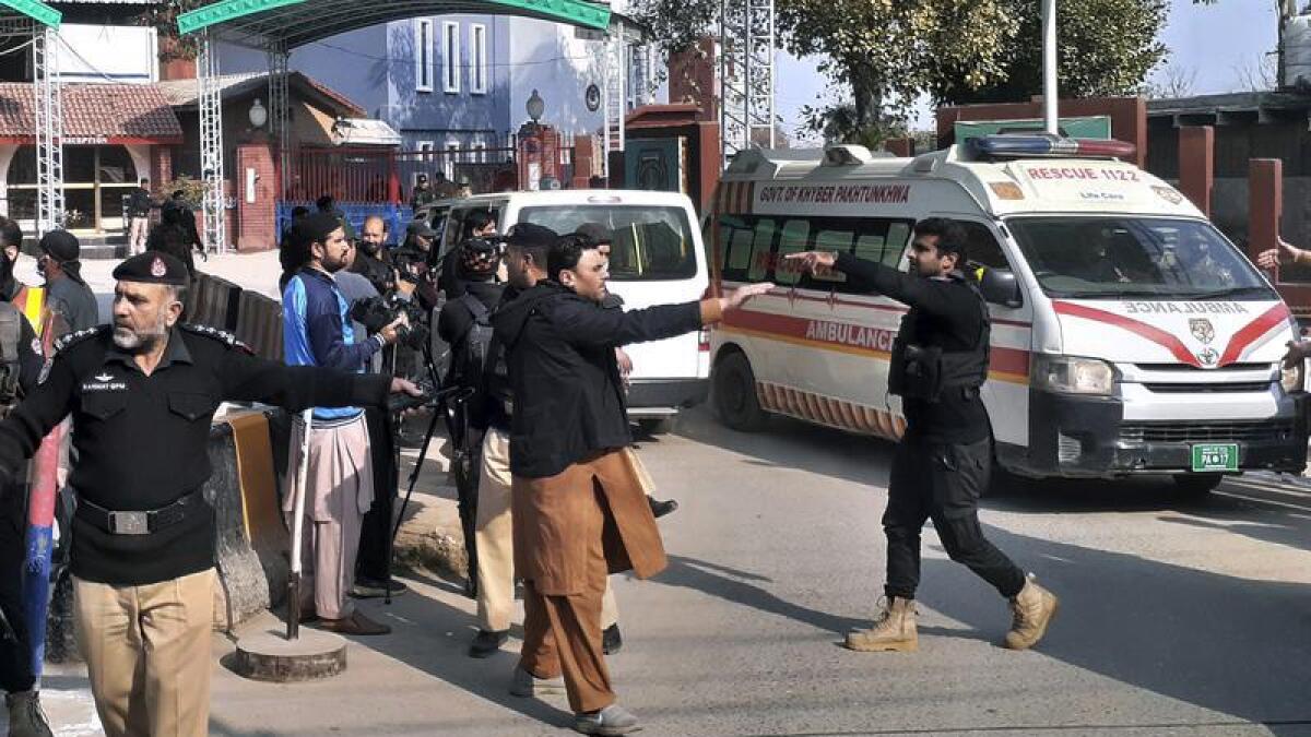 Police and ambulances after the bombing in Peshawar, Pakistan
