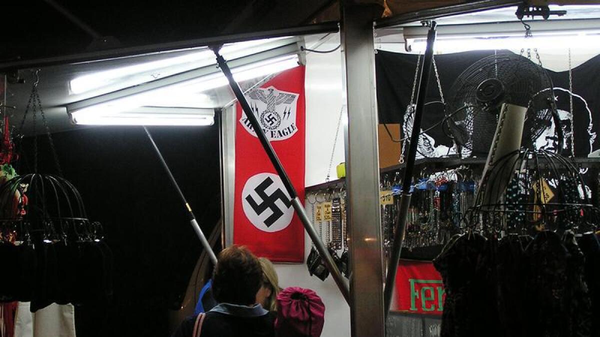 Nazi German flag on display in a store.