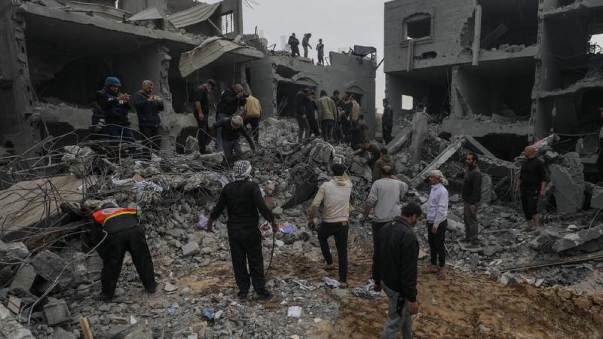 Palestinians search for survivors amid rubble in Gaza