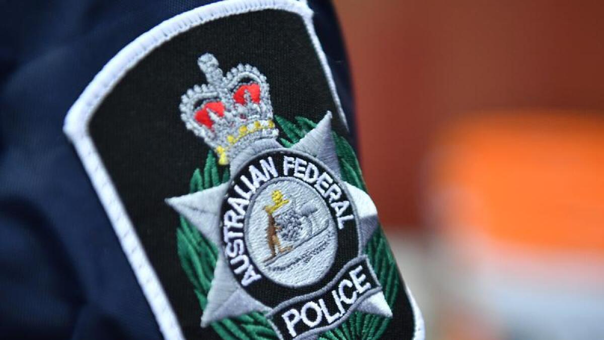 Australian Federal Police badge.