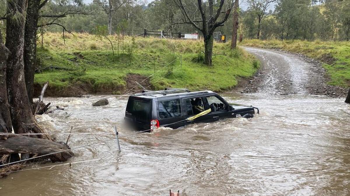 A car trapped in floodwaters