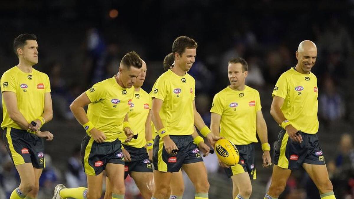 A match crew of AFL umpires