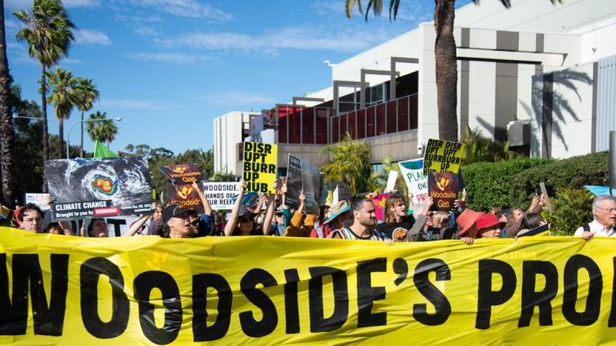 Protesters outside the Woodside AGM in Perth.