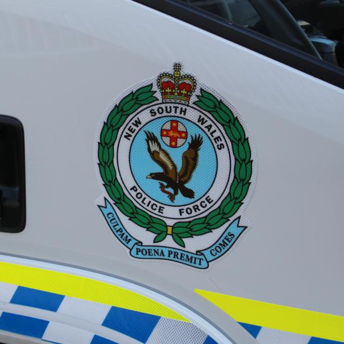 A NSW Police logo.