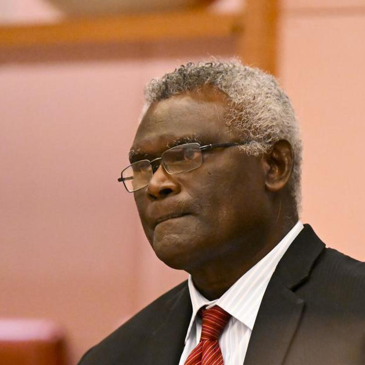 Solomon's pro-China PM retains seat, vote continues