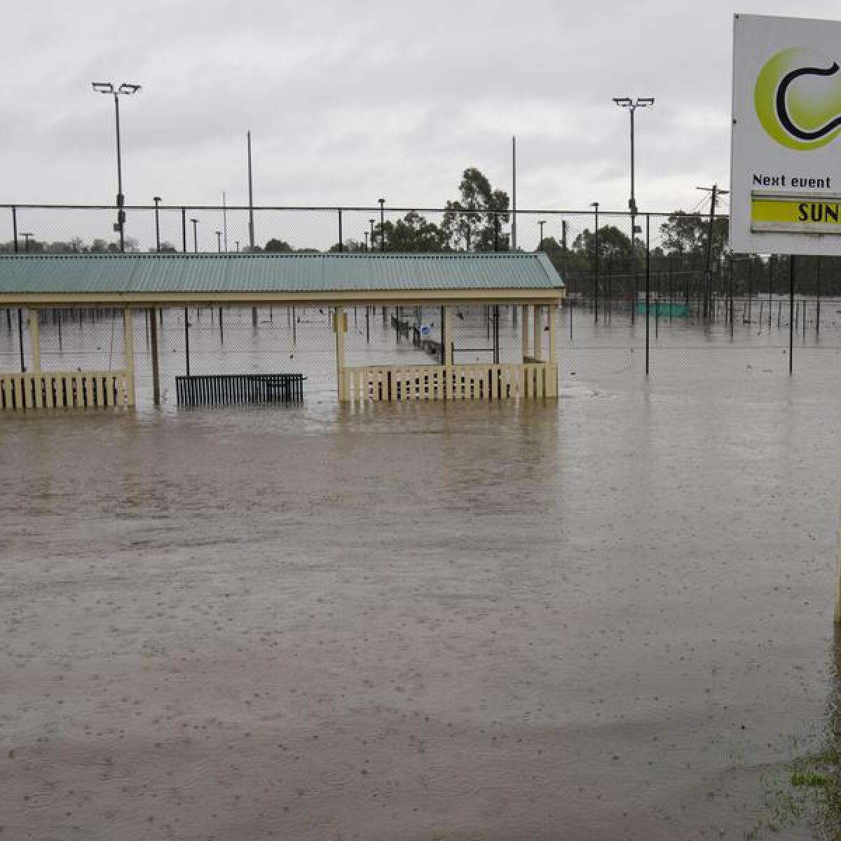 Flooded tennis courts in Camden, in southwest Sydney