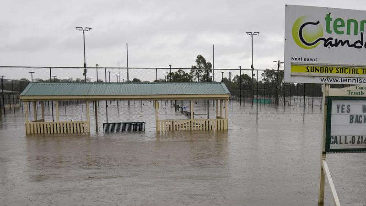 Flooded tennis courts in Camden, in southwest Sydney