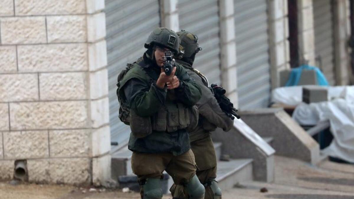 Israeli soldiers in Hawara