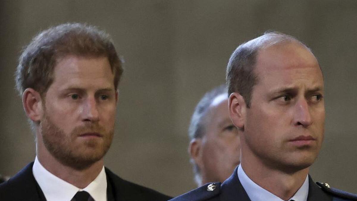 Prince Harry (l), and William Prince of Wales.