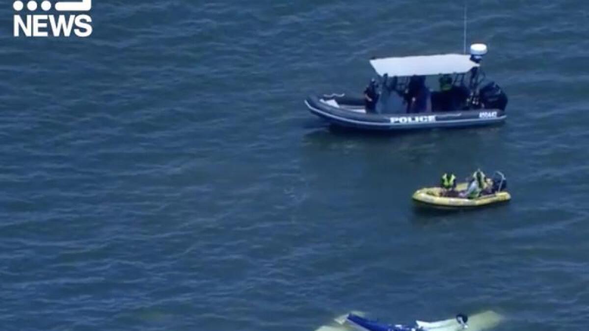 Screenshot from Nine news of the light plane in waters off Redcliffe